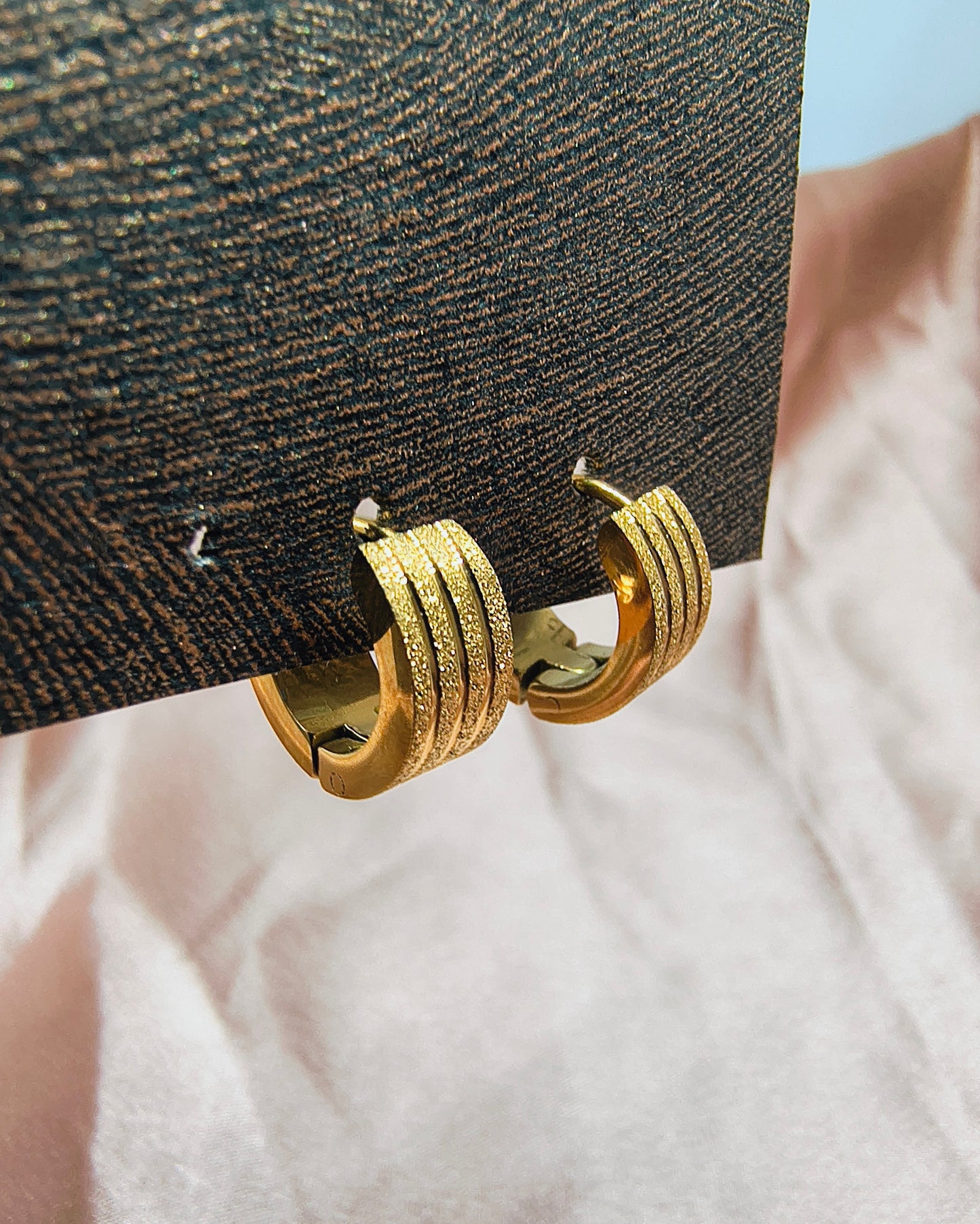 Golden ridge mini huggie hoop earrings