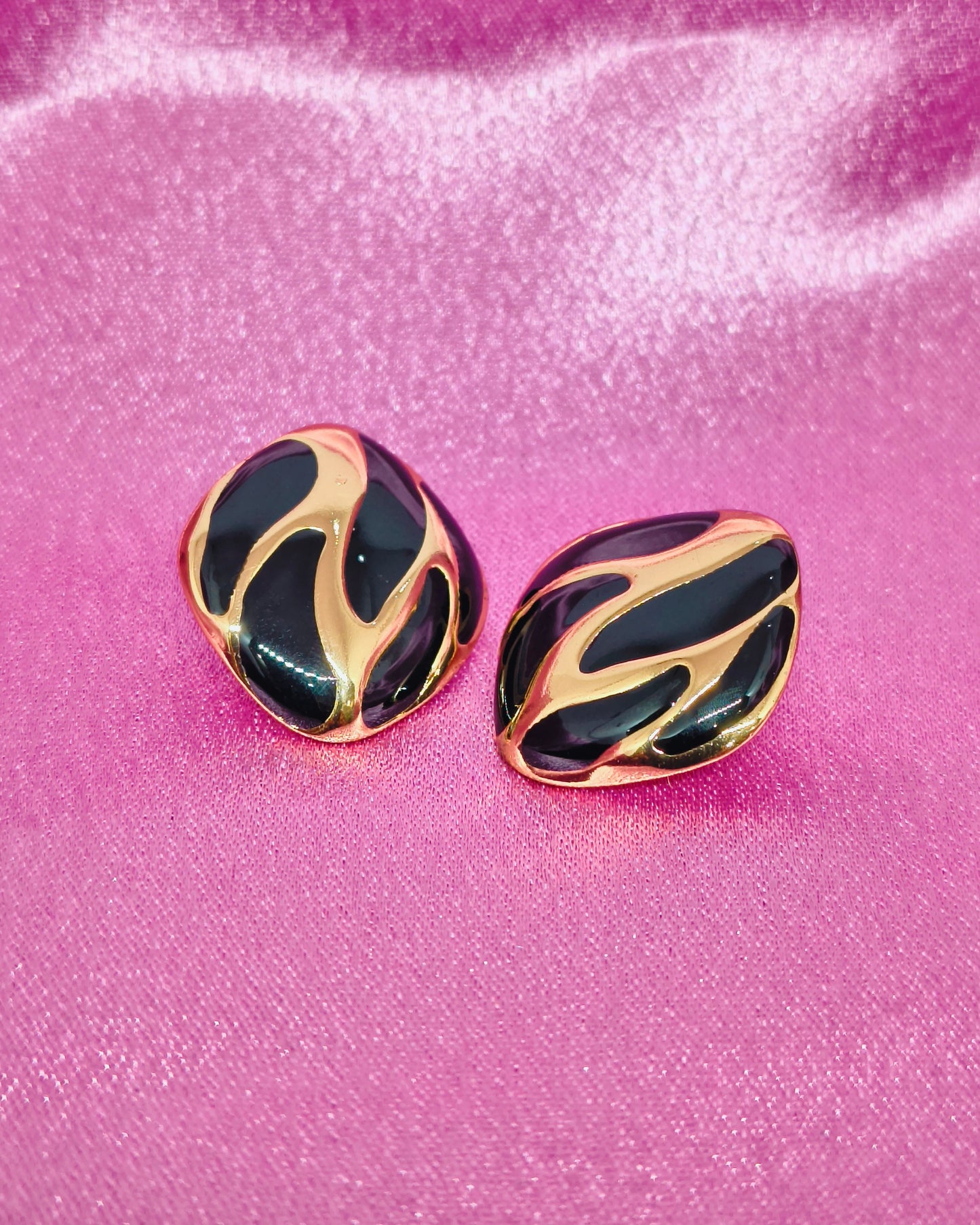 Eclipse swirl stud earrings