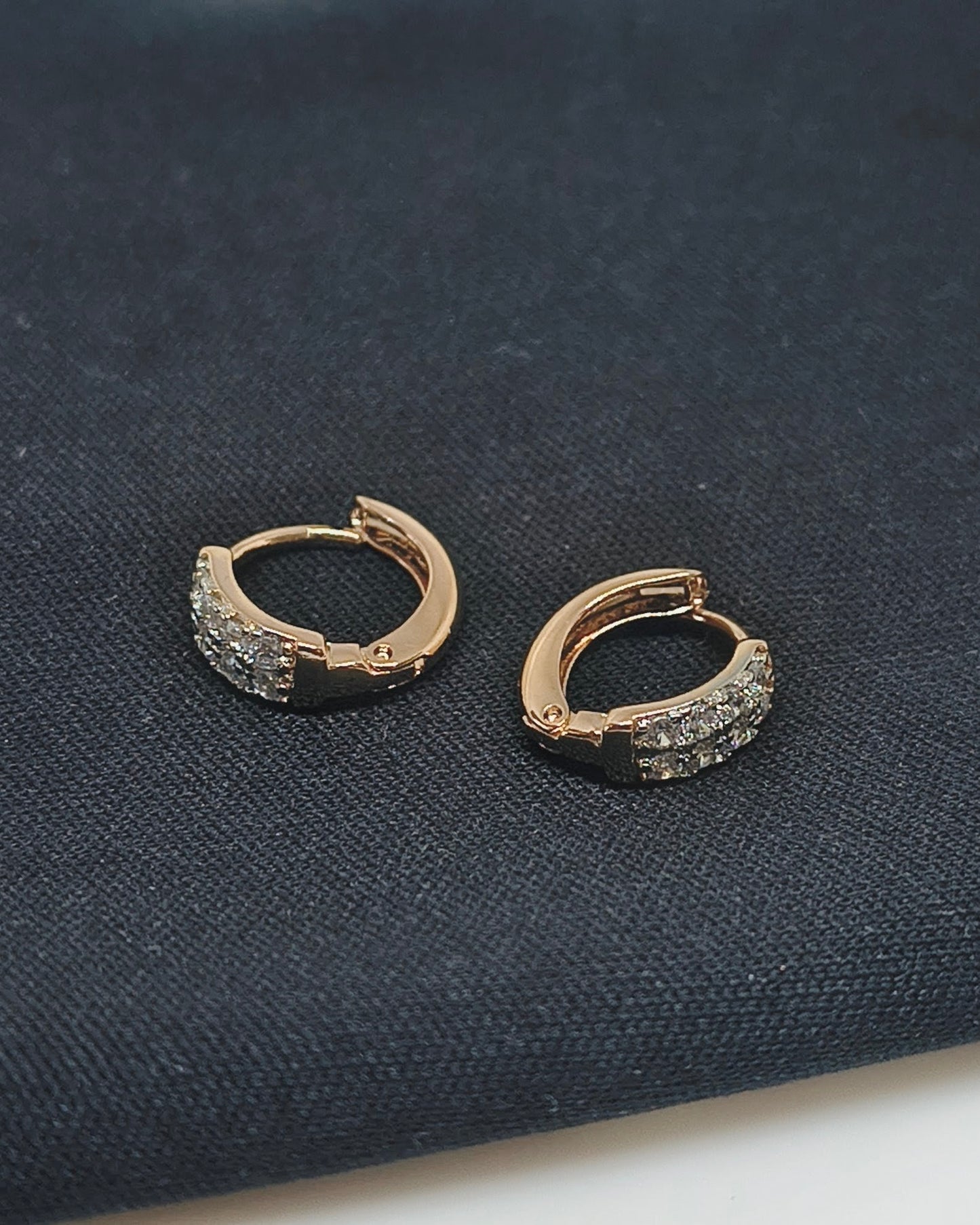 Arc spark huggie hoop earrings