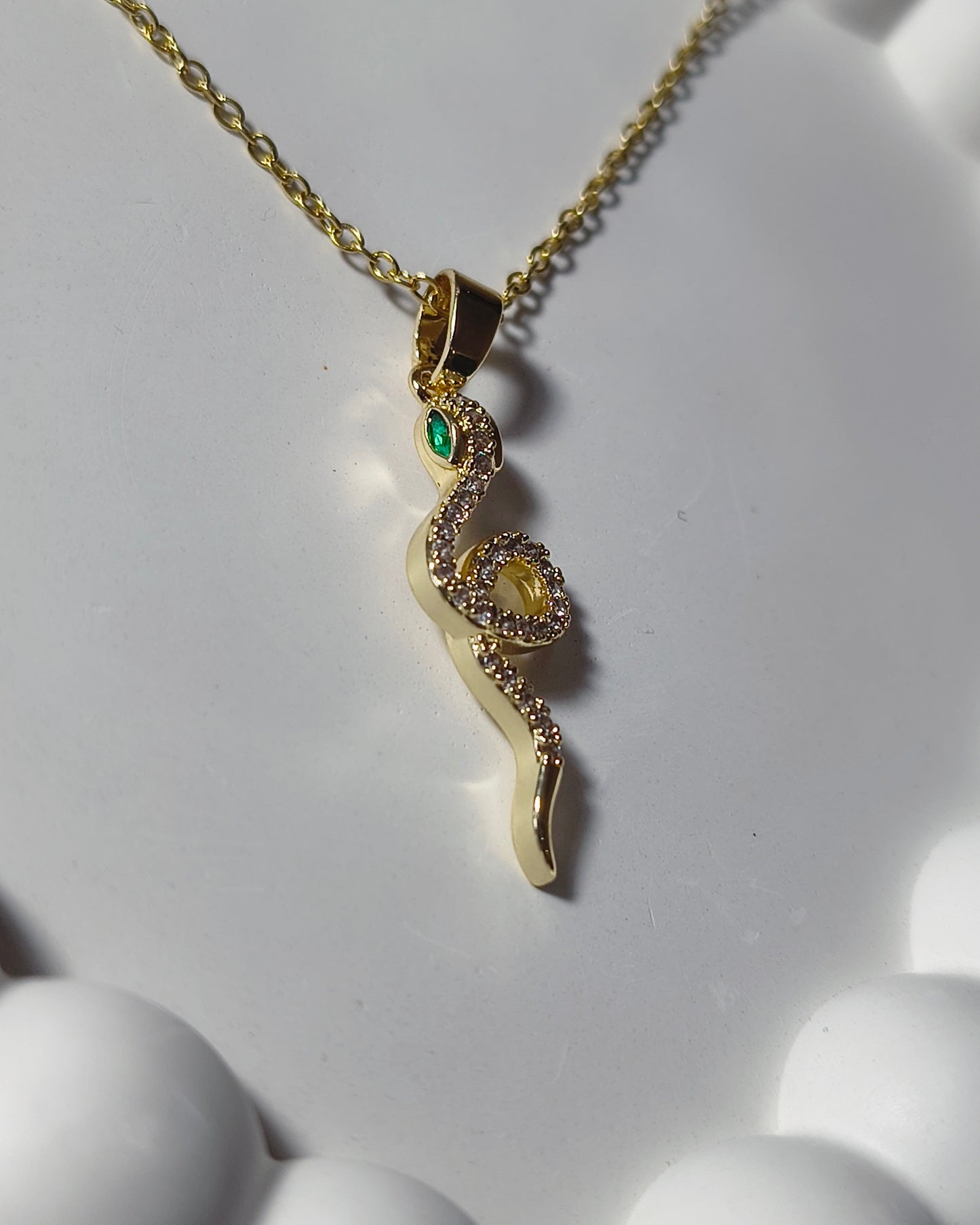 Serpentine glow pendant necklace
