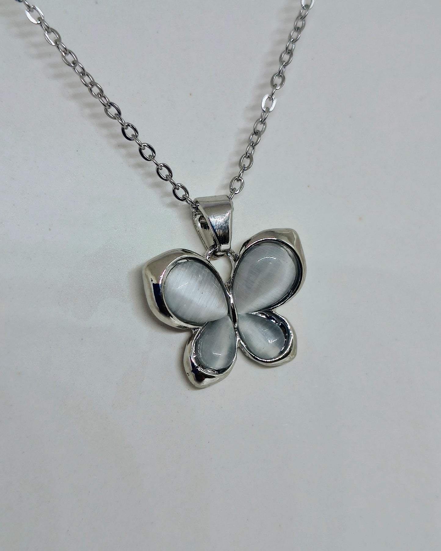 Pearl Glow Butterfly Pendant (Silver Color)