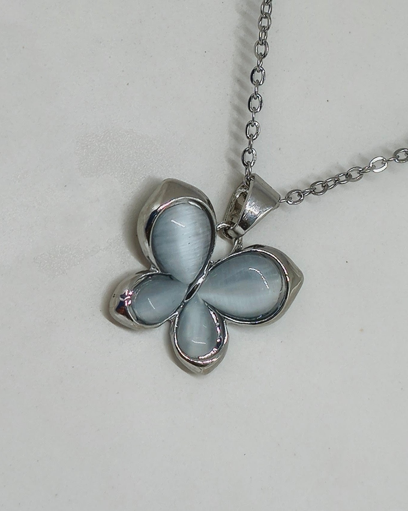 Pearl Glow Butterfly Pendant (Silver Color)