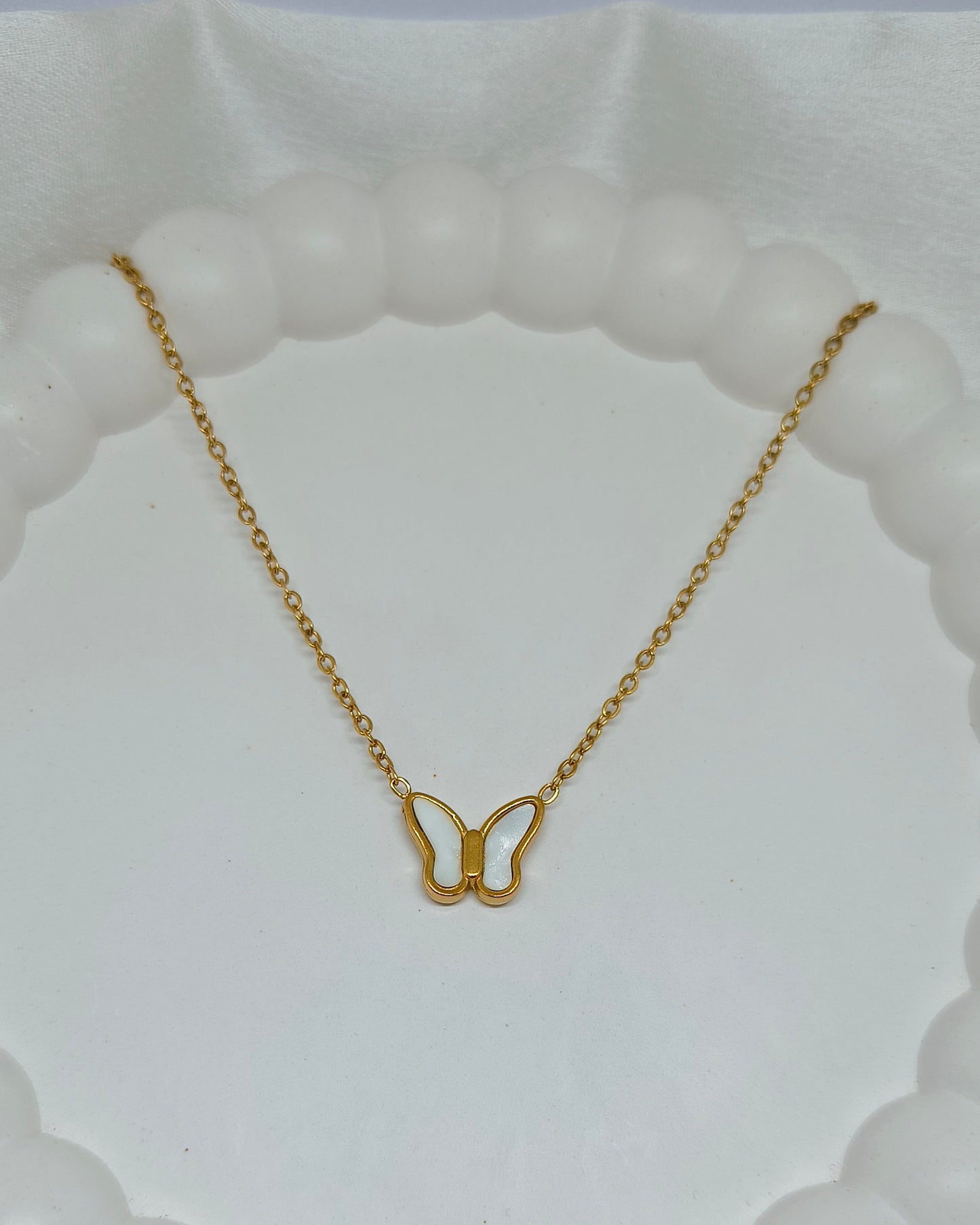 Pearl wing butterfly pendant necklace