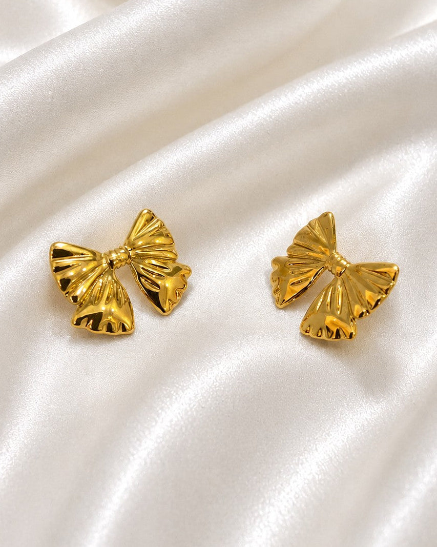 Ribbon bow glow stud earrings