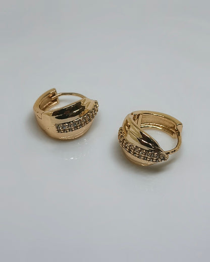 Radiant twist Huggie hoop earrings