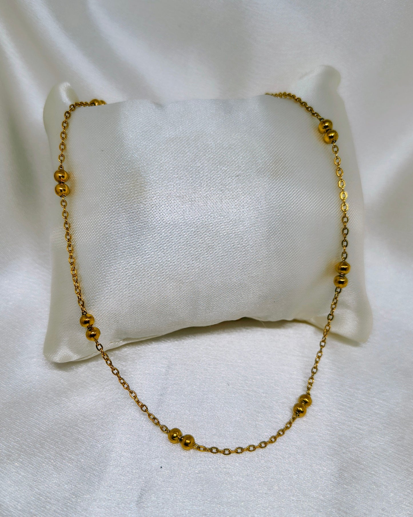 Minimal bead orbit chain necklace
