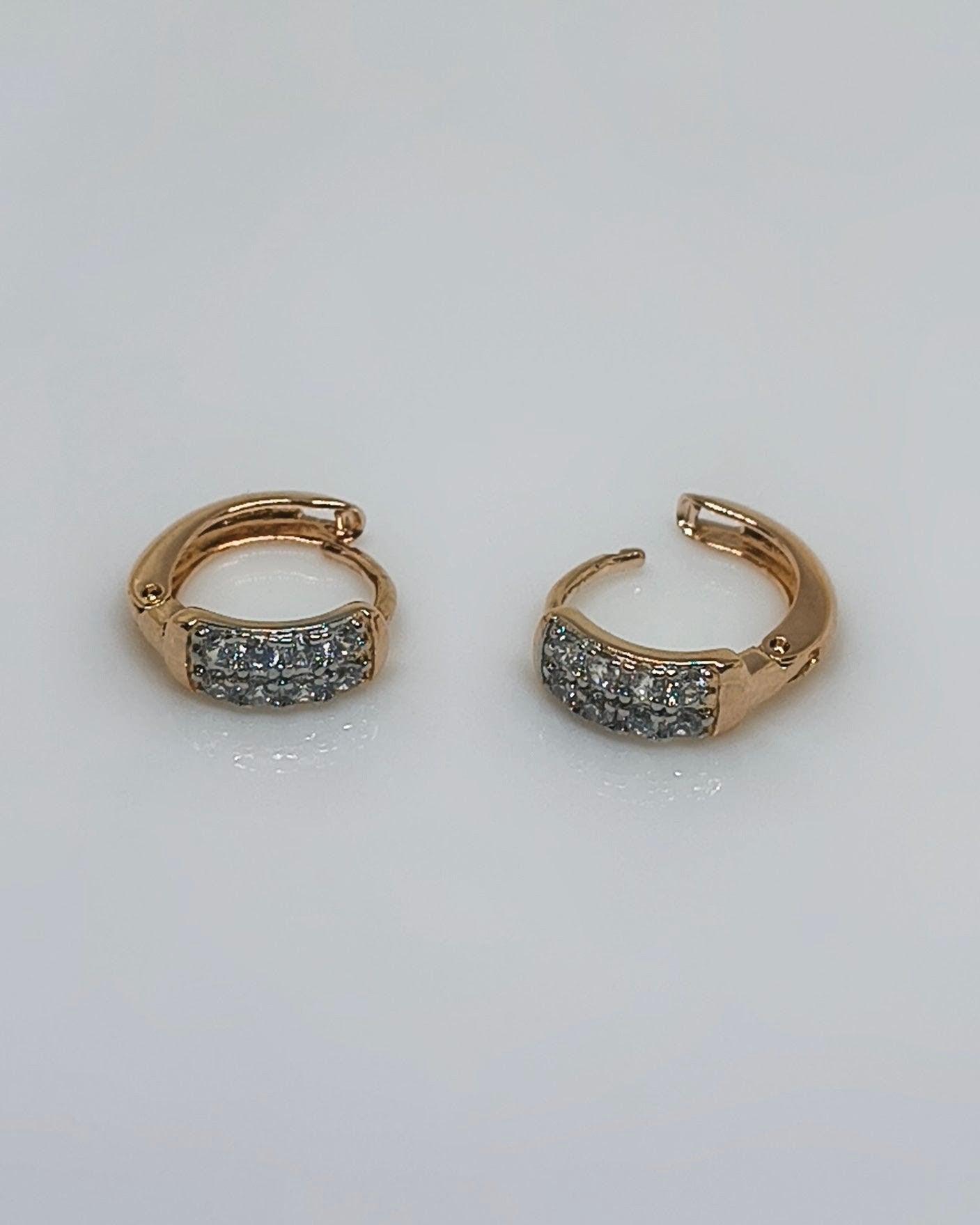 Arc spark huggie hoop earrings
