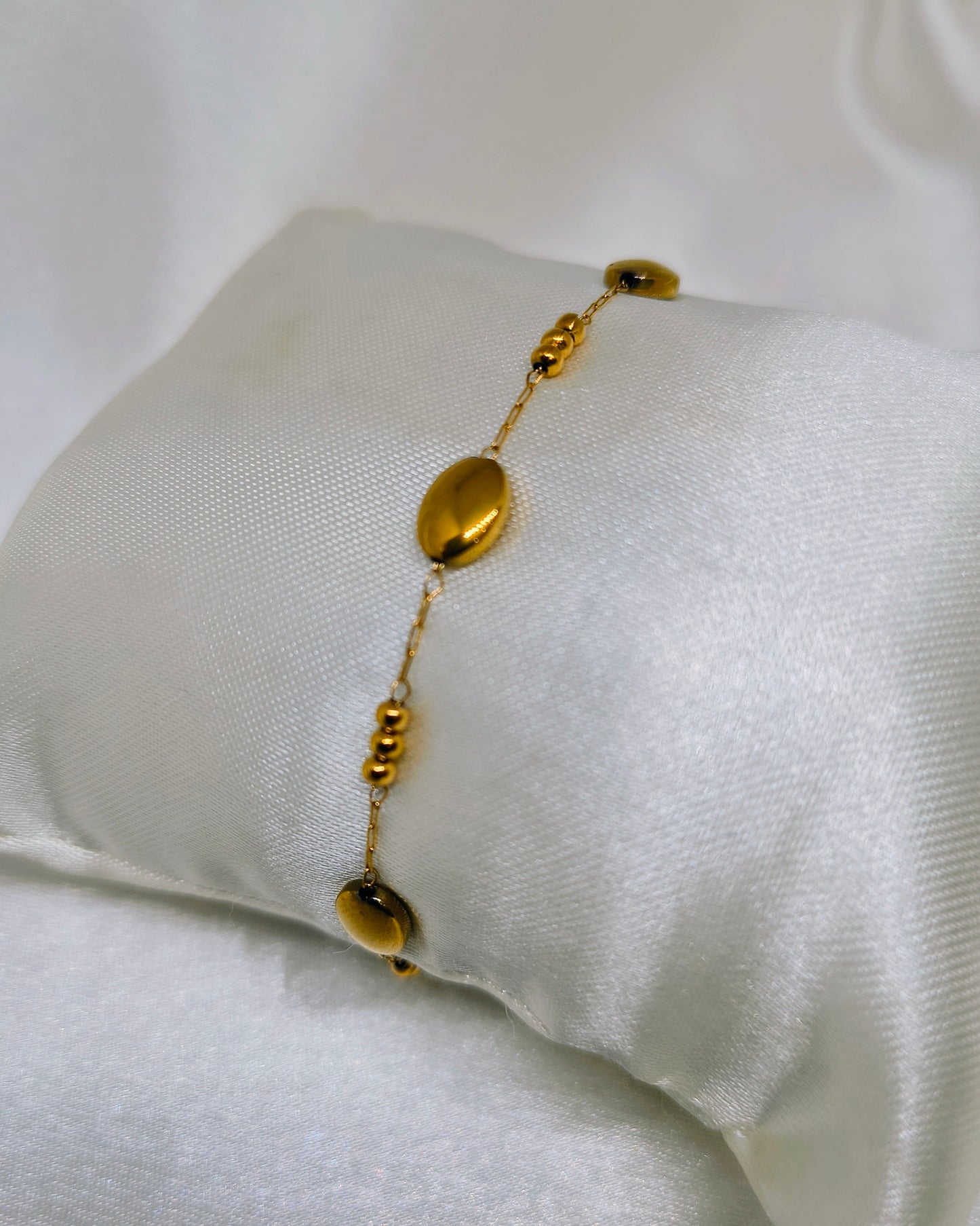 Dainty pebble charm bracelet
