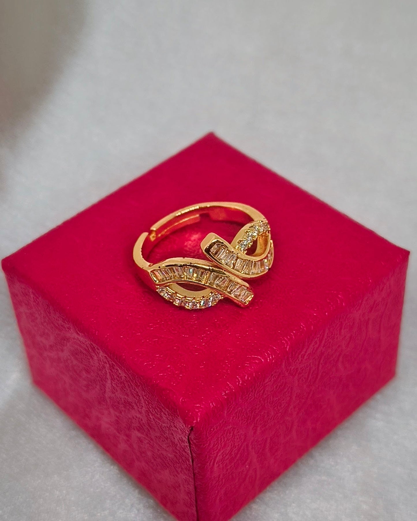 Crystal ribbon baguette adjustable ring