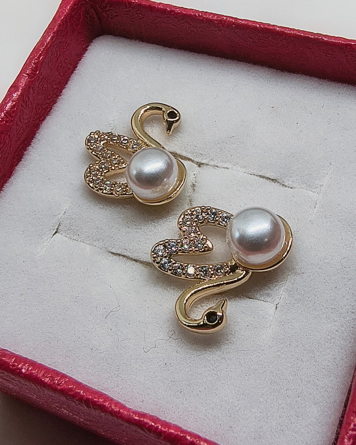 Pearl swan stud earrings