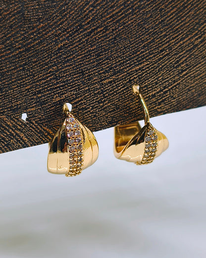Radiant twist Huggie hoop earrings