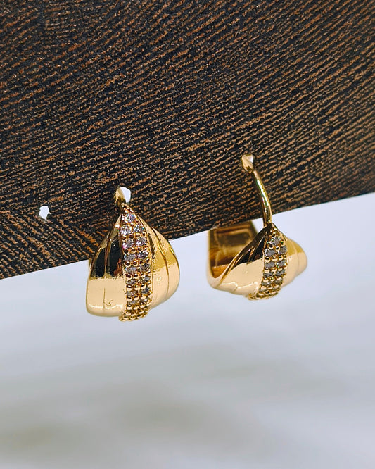 Radiant twist Huggie hoop earrings