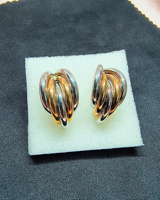 Dual tone swirl hoop earrings