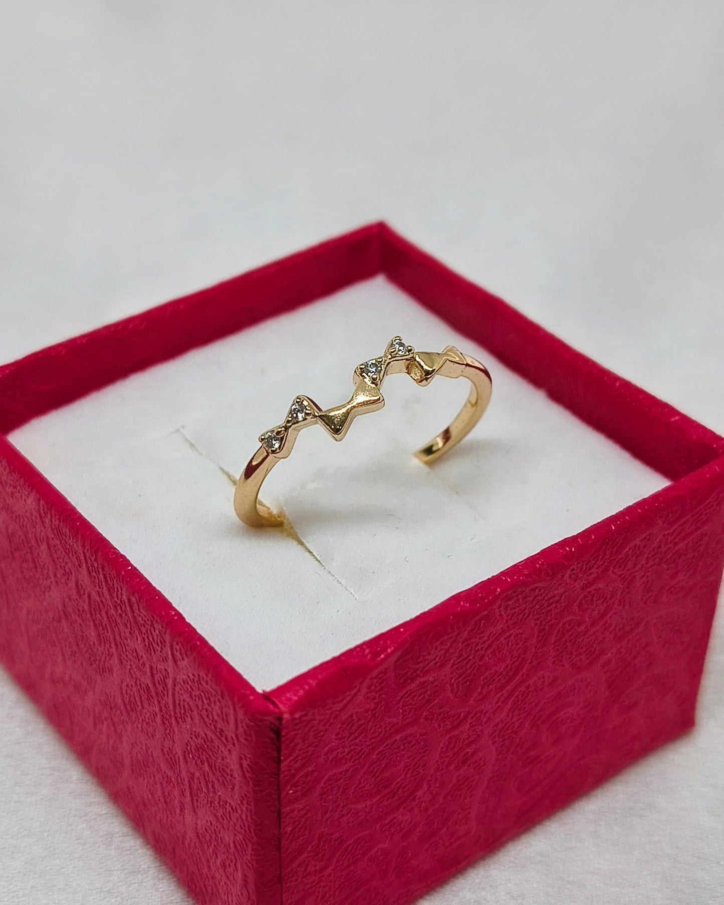 Bow bliss adjustable ring