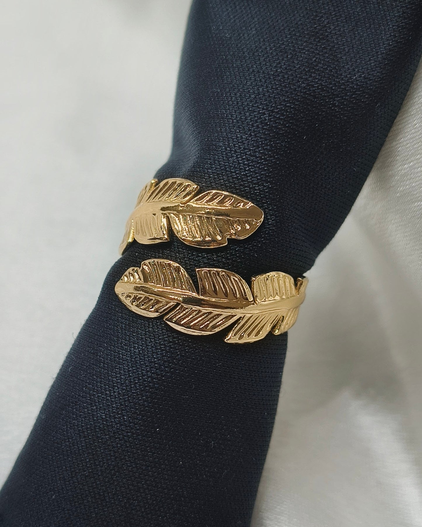 Twin feather adjustable ring