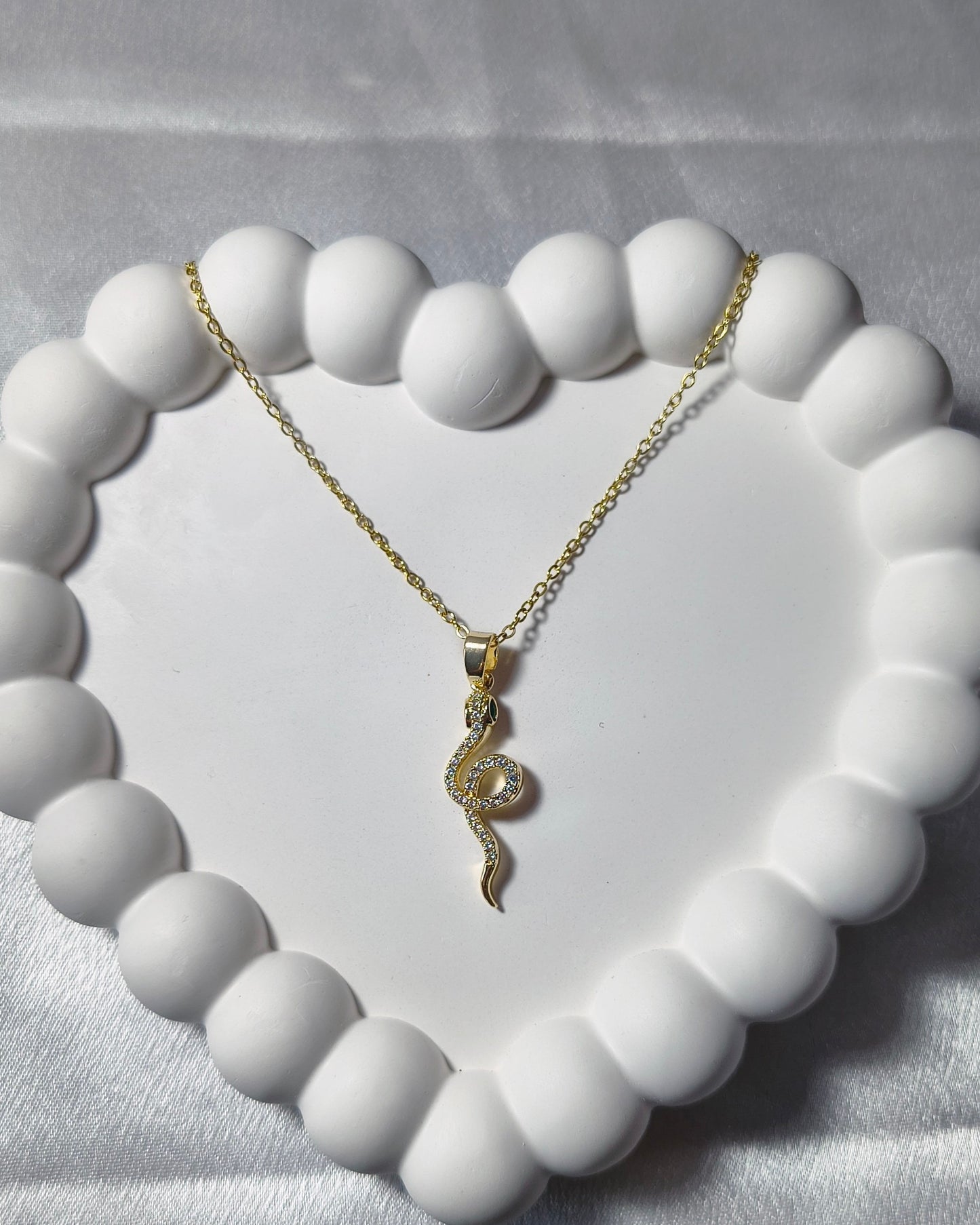 Serpentine glow pendant necklace