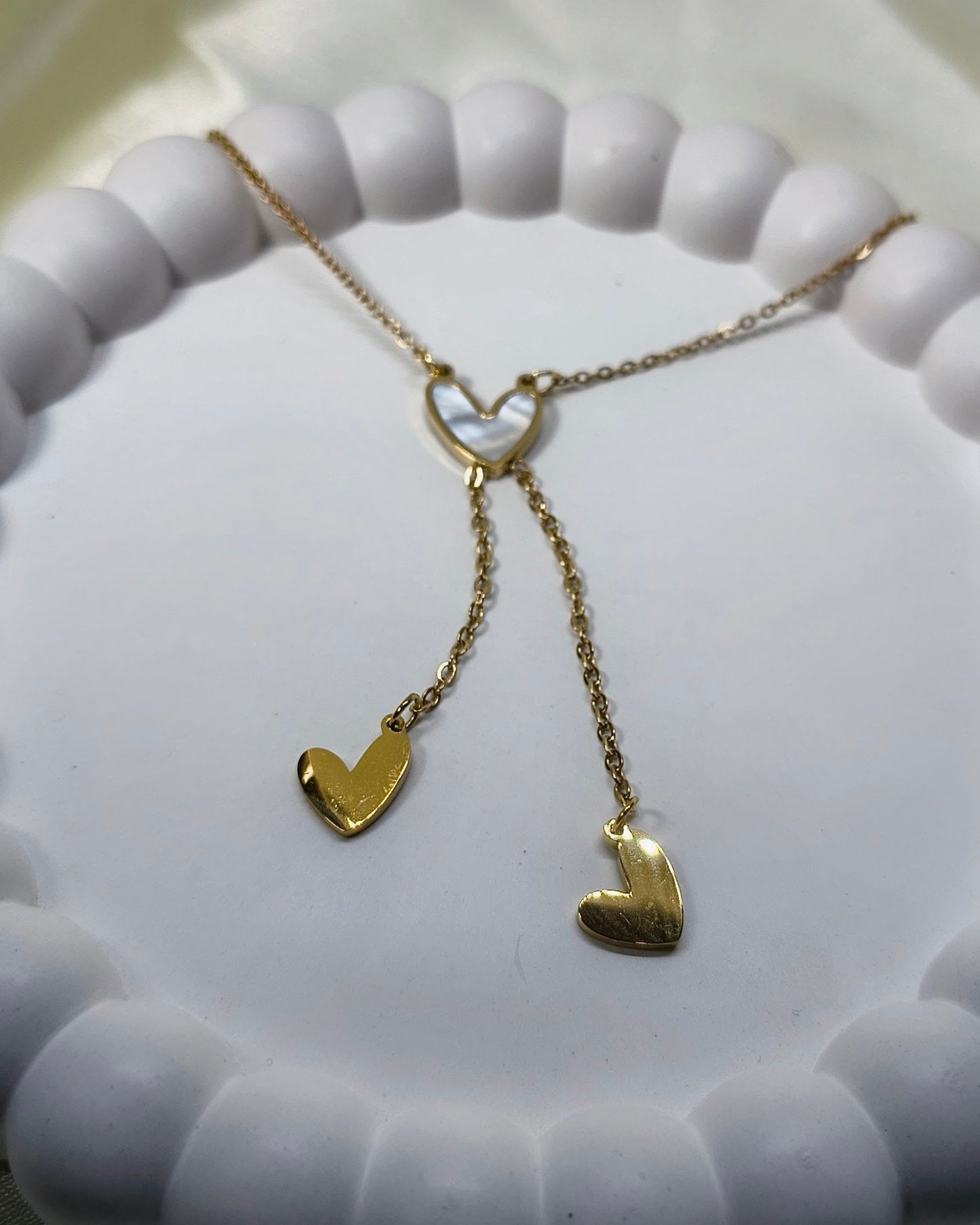 Triple heart lariat pendant necklace