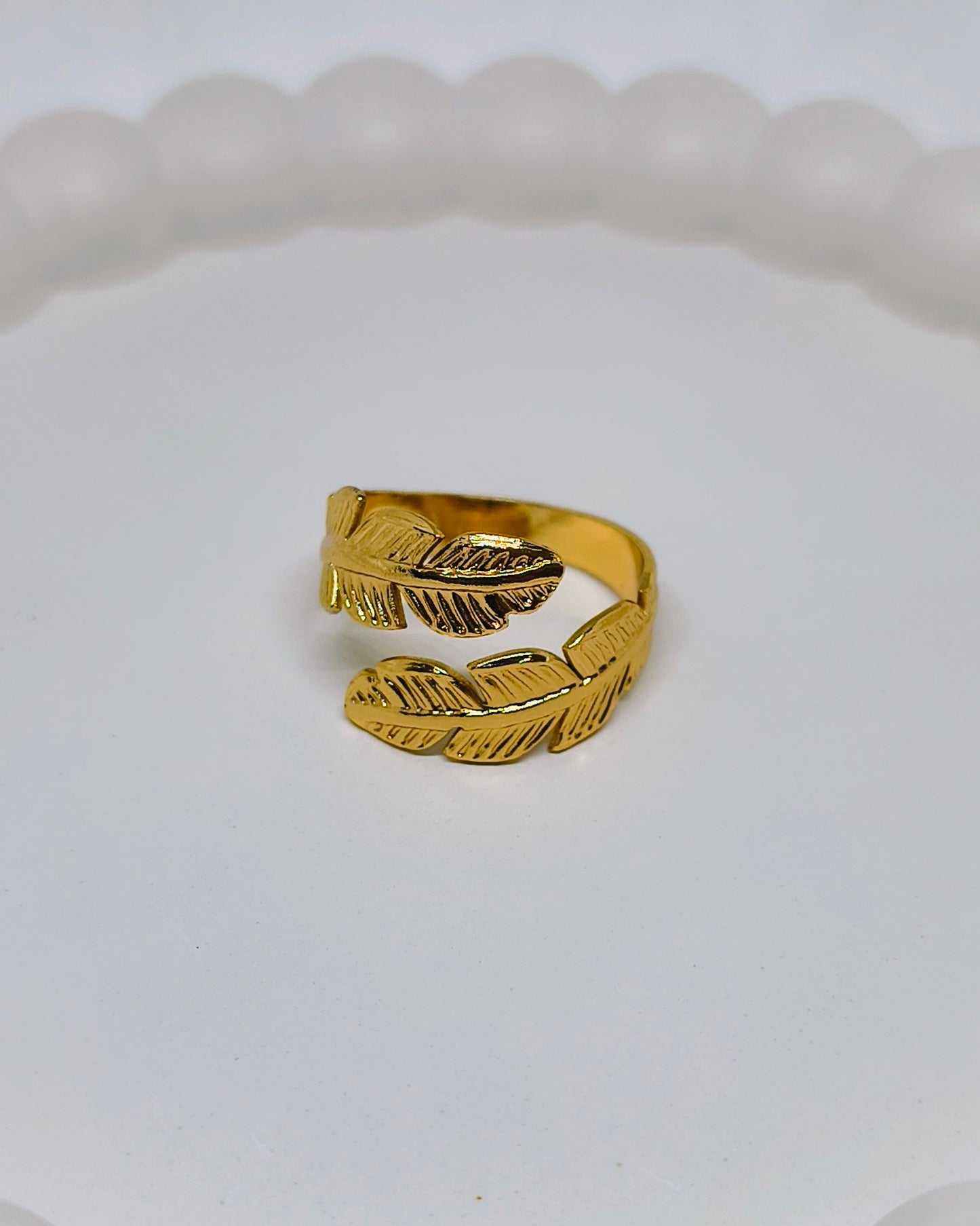 Twin feather adjustable ring