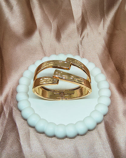 Twisted tide statement kada bracelet