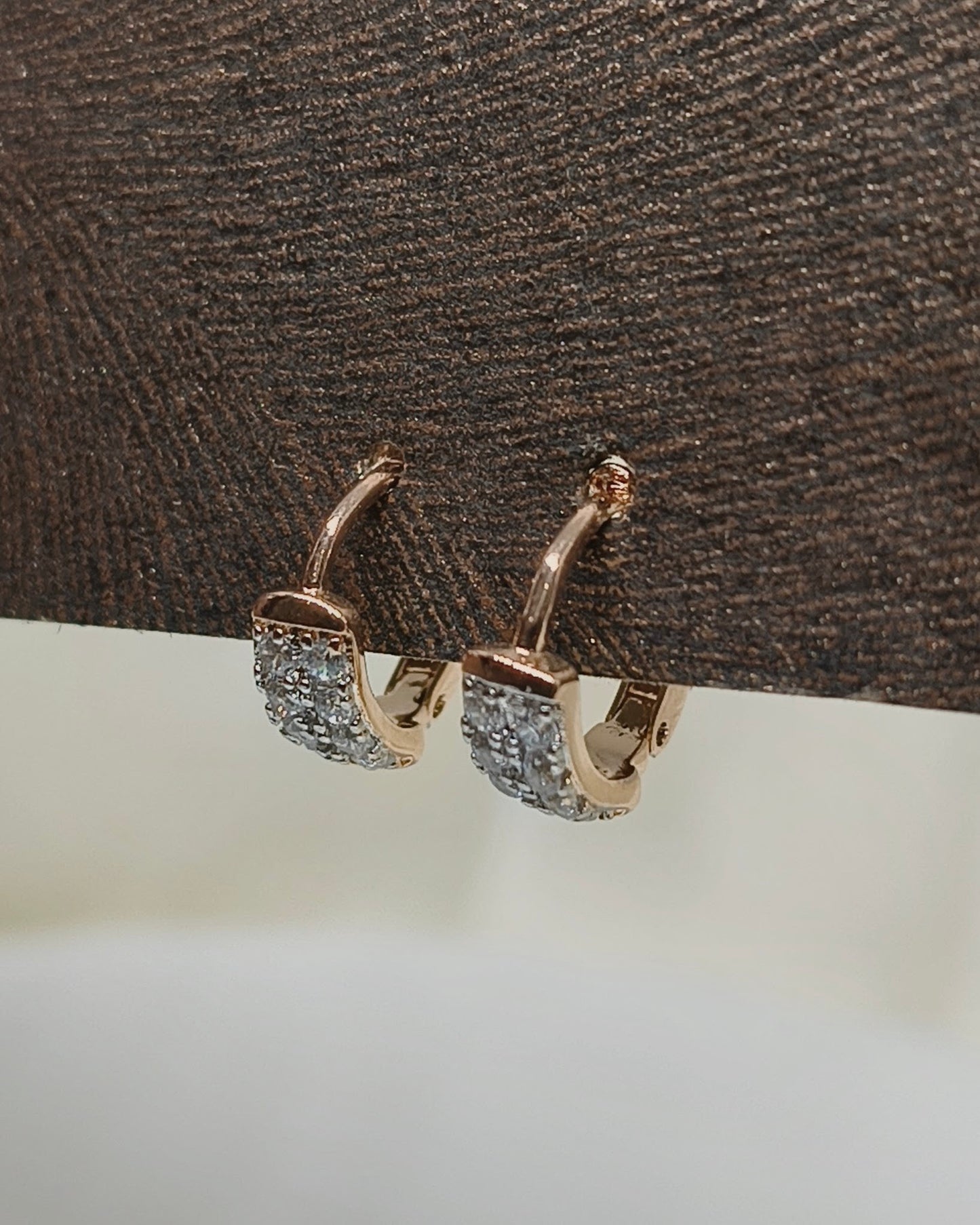 Arc spark huggie hoop earrings